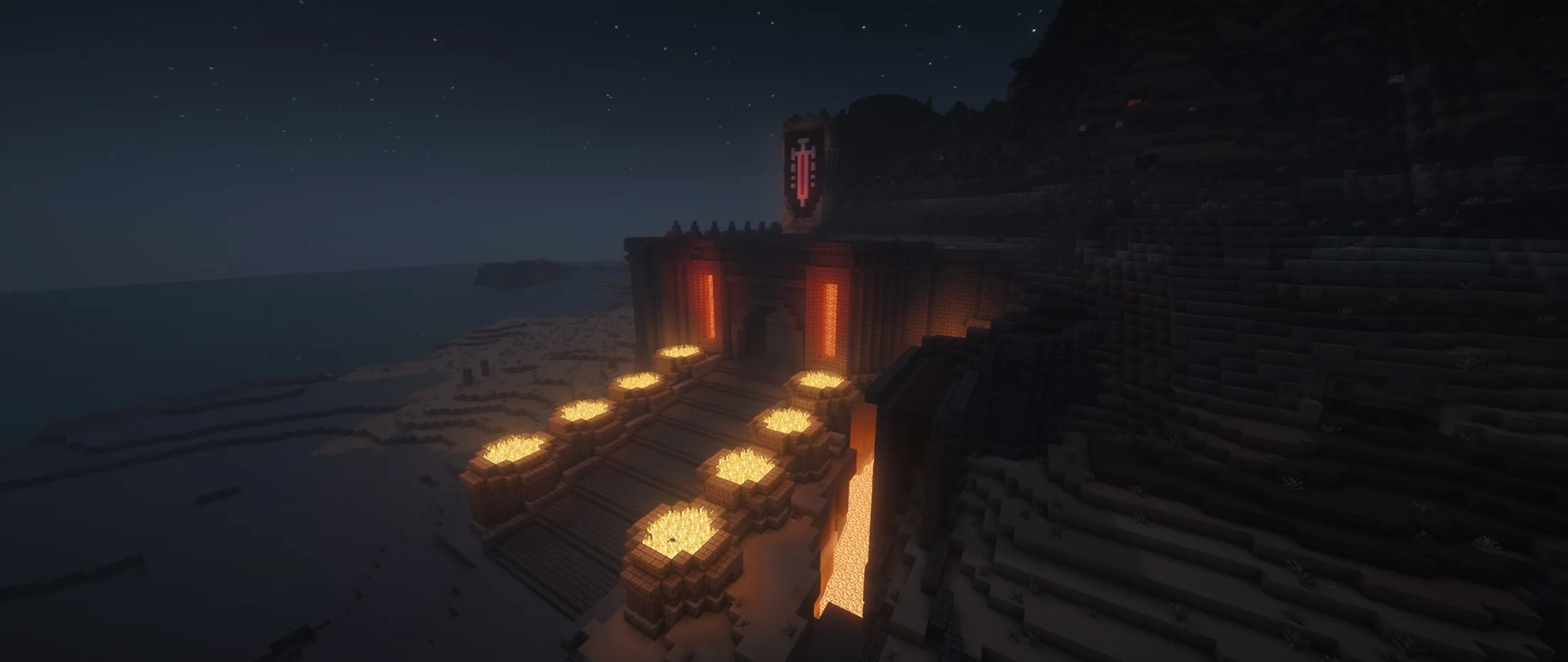 A lava-lit gate built into a mountainside